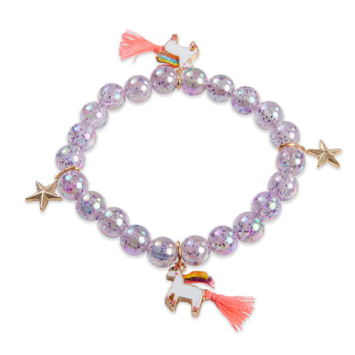 Purple beaded bracelet with unicorn and star charms on a white background