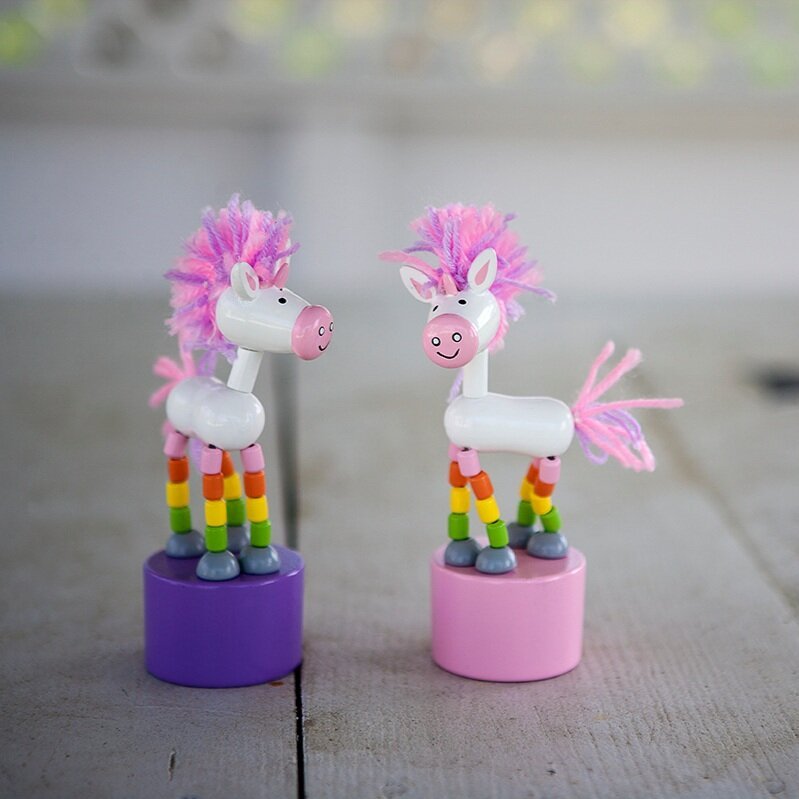 Unicorn Push Puppet - the unicorn store